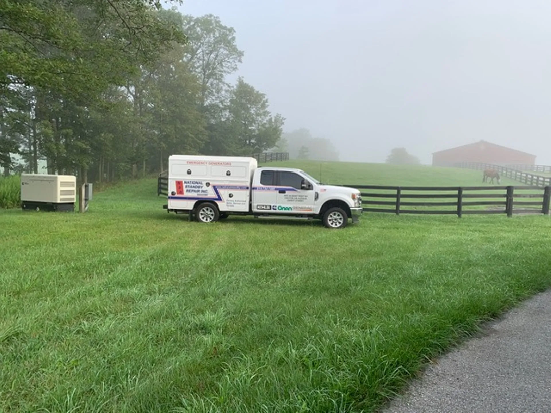 National Standby service truck beside a residential generator